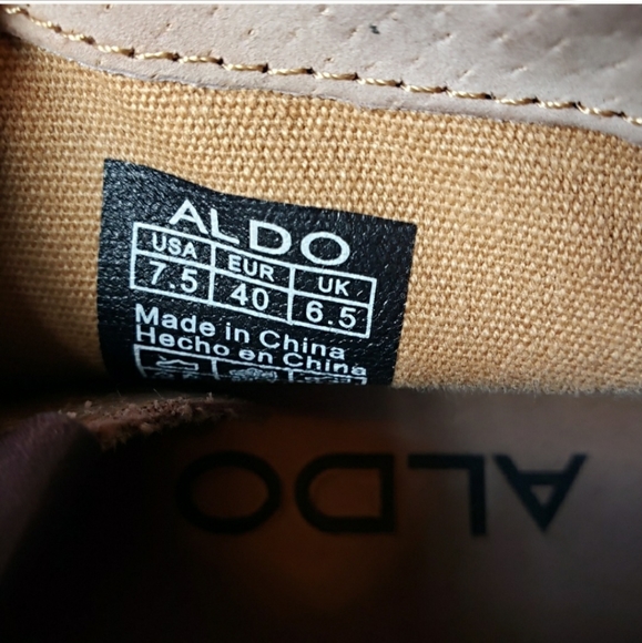 Aldo leather chukka boots w suede accents at back of heel and around top edge.